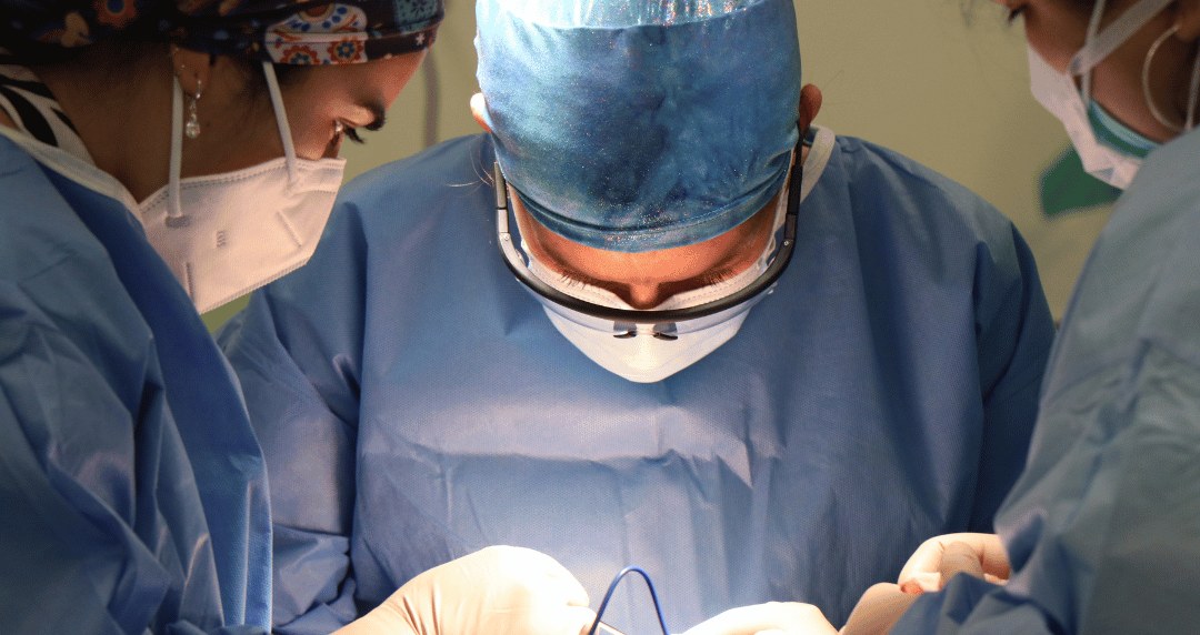 Surgeon performing gallbladder surgery using modern laparoscopic techniques